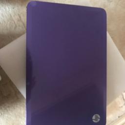 Purple colour, unsure of specific specs but if this information is needed do not hesitate to ask, pristine condition, used but only for work purposes, comes with the charger and has had a full system wipe and clean.