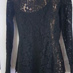 Brand new never worn beautiful ladies ASOS black top, lace detail with a frill detail . long lace sleeves. sz 10 bust to fit up to 36-38"
non smoking pet free home Collection Eastwood Leigh on sea or post tracked pay pal for this service £2.95
