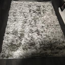 Silver shimmer rug, 170cm x 120cm. Brand new, only selling as doesn’t really go with my decor. 

Paid £55, will accept £45 ovno.

Collection from S12.
