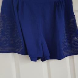 A brand new never worn ladies beautiful blue shorts. has crochet detail to sides. side zip fastening. bought from ASOS so of good quality.  sz10 waist to fit 30". 
non smoking pet free home Collection Eastwood Leigh on sea or post tracked £2.95 pay pal payment for this service