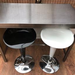 Stainless steel table with 4 bar stools
Great condition table does have few scratches
Table measures 47” long, 23” wide & 35” tall
4 bar stools 2 black & 2 white
All have a lever to adjust up or down and foot rest

Collection from Newbold