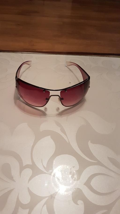 — sun glasses