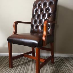 This is a lovely chair

Brown Leather

Chesterfield style

Lovely shape arm rests

Wooden frame

Solid and sturdy