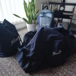 All navy blue in colour and in great condition. Backpack, drawstring bag and big holdall on wheels! Picked up while working in fitness first but never used and no use for them now. sold as a set.
