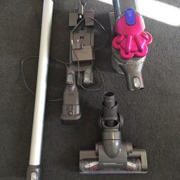 Used Dyson DC35 in good working order. Comes with wall mount, solid extension, motorised brush head, dusting tool. One wall mount catch is held on with tape but still works.