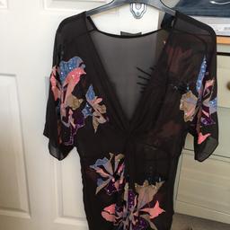 Stunning Allsaints summer dress 100% silk with sequins Embellishment
U.K. size 8 will fit a small 10