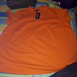 orange top
size 24
brand new with tags