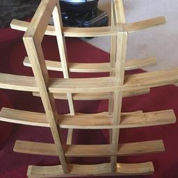 Stylish and perfect condition pine wood wine rack!
Great quality and can hold 12 full size bottles.
Amazing rack but barely used! Needs wine! :)