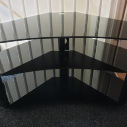 A stylish glass TV stand, designed to be used in the corner of the room, with glass its a perfect match for any LCD, LED or plasma television up to 42". This product is ideal for the new curved TV's its got cable management.