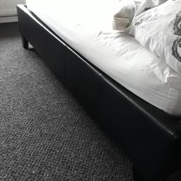  double brown faux bed frame good solid condition.. mattress included brand new bed forces sale. PICK UP ONLY