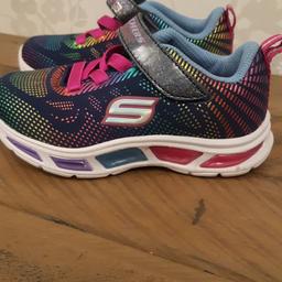 size uk 7. girls sketchers trainers. never worn with flashing lights.