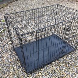 Large dog cage in good used condition. 
36 inches long 25 inches tall. Compleat 
with strong plastic tray.