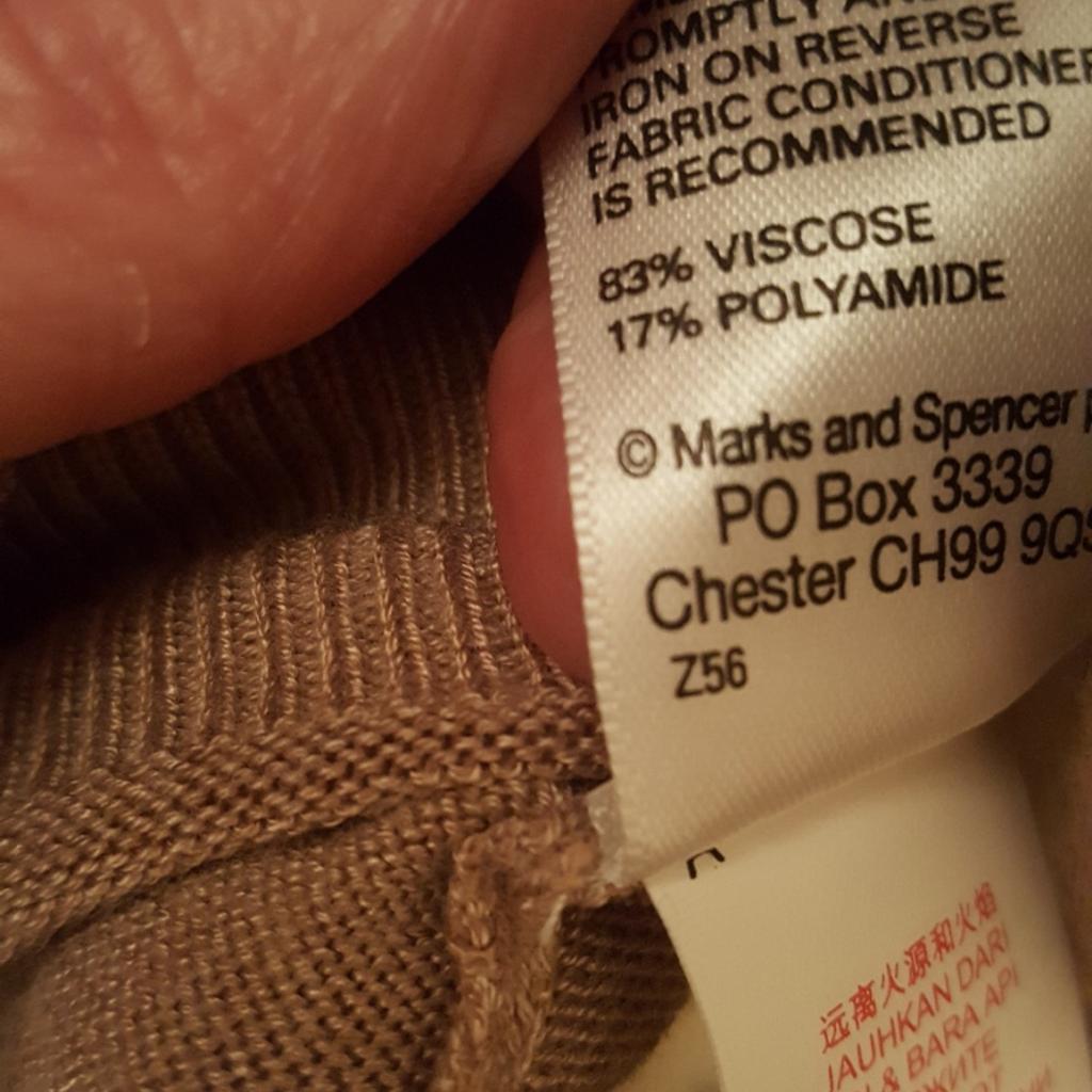 Brand new with tags. M&S v neck jumper. Nice detail throughout. Soft touch. Beige/Caramel colour. This jumper is not acrylic. Size 10.