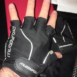 Used bicycle gloves black and grey color