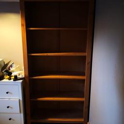 Ikea medium dark pine bookcase. Good condition, dismantled for collection. Laminated chipboard. Odd mark from use.