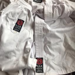 3 white MAR international karate suite 3 different sizes, 5 years,  6/7 years and 8/10 years in great condition
