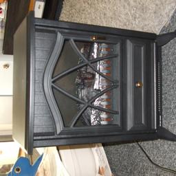 hi im selling my old electric coal fire look very nice and clean cheap uick sale 12 pound