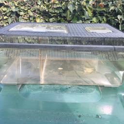 In good used condition, no cracks.
Comes with a removal partition and 
2 top openings,     £5 each 
Also useful for small animals
16inches long. 12inches wide. 7inches tall.