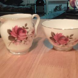 really nice sugar bowl and milk jug. made bye honey bunce.