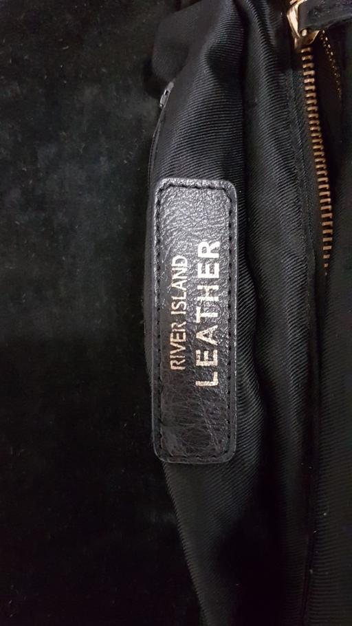  — ladies leather bag