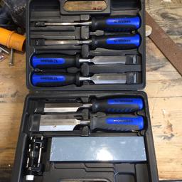 Set of 6 chisels in box with oil alone and honing wheel 
Unused