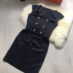 Navy with gold buttons

Size 8 UK