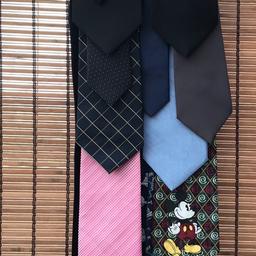Tie rack and 16 different ties
Official tie rack holder clips into wardrobe like normal coat hanger
Also variety of different ties including football mad, Dennis the Menace & Disney Mickey Mouse

Collection from Newbold, Chesterfield