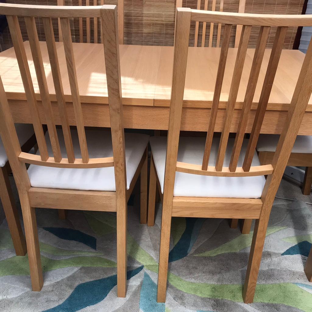 6 solid dining chairs with white padded seats in PO22 Arun for £50.00
