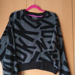 Grey and black oversize jumper, warm material very comfortable just don't wear no more size medium