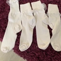 Two pairs of white kids socks never worn,  size 12 to 3 years