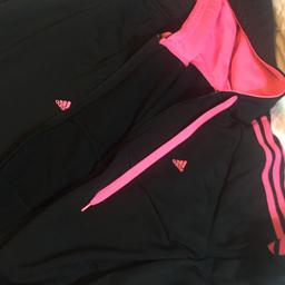 Ladies track suit, size 16-18 Large, black n pink, only worn twice. Very good condition, comfortable to wear.