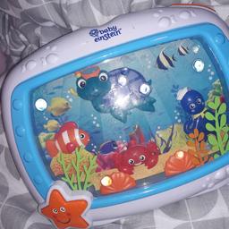lovely baby mobile that sings and lights up/all the fish move around amazing condition works perfectly