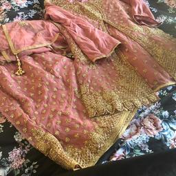 Heavy shalara suit worn once for 2 hours bought it for £220 will accept £100 size 46 dusky pink and gold heavy work on kameez and shalara will consider decent offers