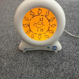 Gro Company Gro-Clock Sleep Trainer, with plug but without instructions (instructions can be found online)or original packaging.
The Groclock uses the stars and sun to communicate when to go back to sleep and when it's time to get out of bed.
Glowing screen shows images of stars and colours to communicate 'sleep' and 'wake-up' time.
Stars go out one-by-one during the night to show the passing of time.
Key-lock option. Option to set two separate wake-up times.
Adjustable screen brightness