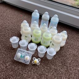 12 bottles , dummies and Tommee tippee milk containers prefect for on the go , all in great condition.