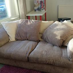 brown sofas with brown and cream cushions.deap seats .very comfortable 7ft x3ft3in .non smokers house. bargain .