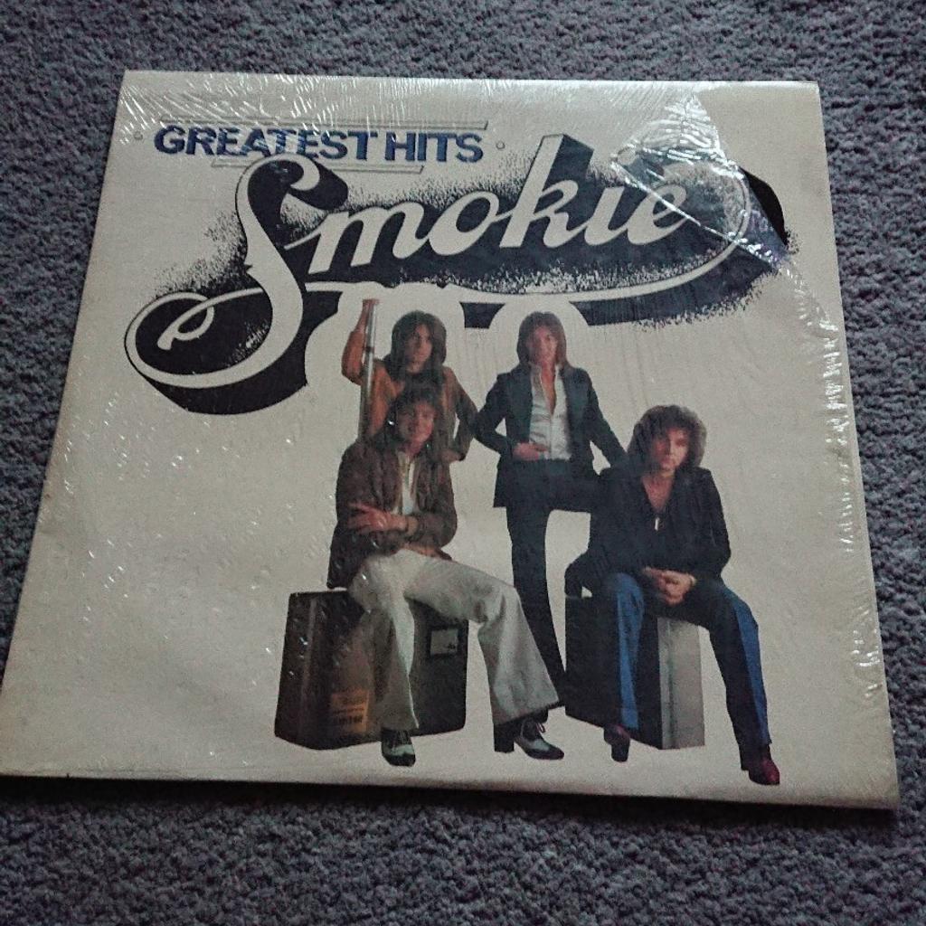 Smokie Greatest Hits vinyl,
Still has plastic cover but open from the side.