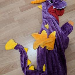 Purple dragon or dinosaur onesie costume. Medium adult size

Has eyes, teeth, wings, tail, scales. Worn once for a Game Of Thrones party

Cash on collection from Leicester Square or Elephant And Castle