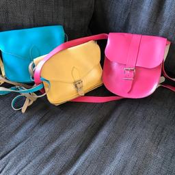x3 multi coloured satchel style leather handbags.

£20.00 ono

London