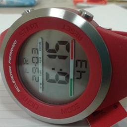 Ferrari digital watch in red, silicon strap,stainless steel bezel large watch 48 mm and waterproof to 30 m.
I acquired a small quality of these watches direct from a jewellers who went bust. The watches don't come with retail boxes but you are saving £110 on the retail price. 100% genuine.