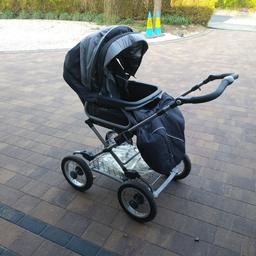 Excellent condition, comes with rain cover and foot muff.

