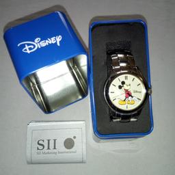 Genuine Mickey mouse watch worn couple of times.. in original box and paperwork.. genuine people only no time wasters.pick up North wingfield chesterfield no offer's check out my other items or payment straight into bank account only need a New battery