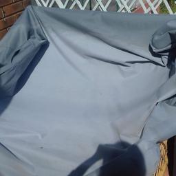 garden sofa with a cover in good condition selling as no longer needed it