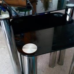 side tables with chrome legs and black glass.good condition. must be picked up