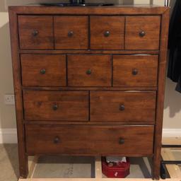 Used. Good quality furniture from Feather & Black with a little wear and tear, with a few scuffs and scratches. You will see a scratch on the mirror base but it sits behind it.

7 drawer chest - W90cm x H107cm x D45cm

Bedside Table x2 - W45cm x H59cm x D40cm

Stool - W45cm x H46cm x D40cm

Dressing Table - W120cm x H79cm x D45cm

Mirror - W59cm x H56cm x D20cm

Stained rubberwood solids and veneers
