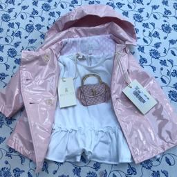 Gucci - new with tags adorable rain coat and top; had bought from Milano last year but didn’t get the chance to dress my daughter in them as she grew... coat price as seen in pic #3 Euro 295 and the top I had paid Euro 100 for it (395 total). Happy to sell at 50% off. Great idea for a gift or for your precious little one. Preferably Collection. Or can drop off if max 20 min drive from me. Or can post and you pay based on Royal Mail fees (free if £2.95), bank transfer in this case please. Thanks