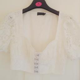 Pretty little thing cropped white lace top
Never been worn