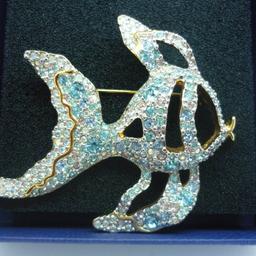 Gorgeous Genuine Swarovski Angel Fish Brooch i will accept paypal and post within the uk for £30 all in. The brooch has the Swarovski swan logo on the back and is in perfect condition.