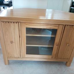 Solid medium oak, 3 shelves for sky box music system etc. 
collection only