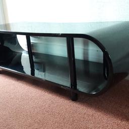 High gloss black. contemporary look. 4 ft long 14.inches high and 16 inches wide. very good condition.  Buyer to collect or will deliver in Settle area. No time wasters please